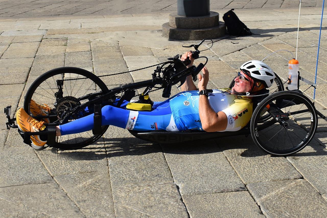 Maurizio Antonini riding a handbike during an inclusive sports initiative